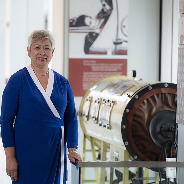 Maureen Lichtveld in front of Iron Lung