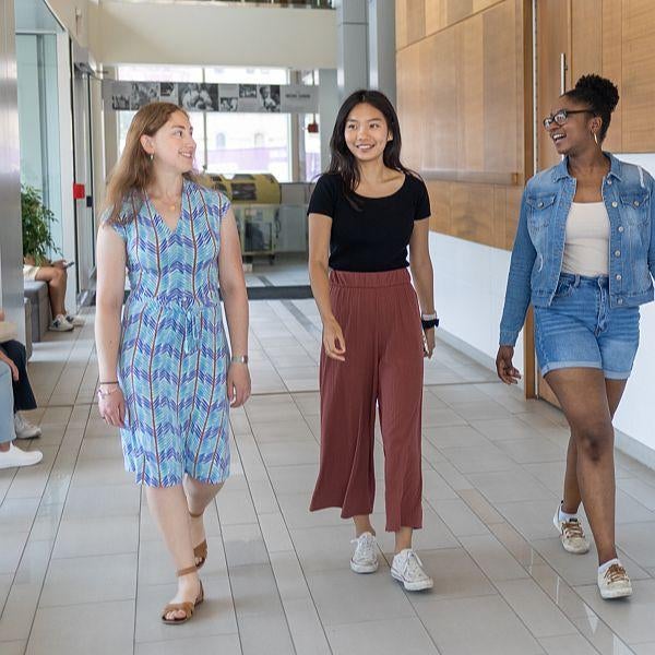 students walking in fifth ave foyer