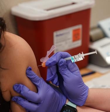 Vaccination rates are going down, and they don’t have to go down much further for things to be problematic,” said Mark Roberts, professor of health policy and management 